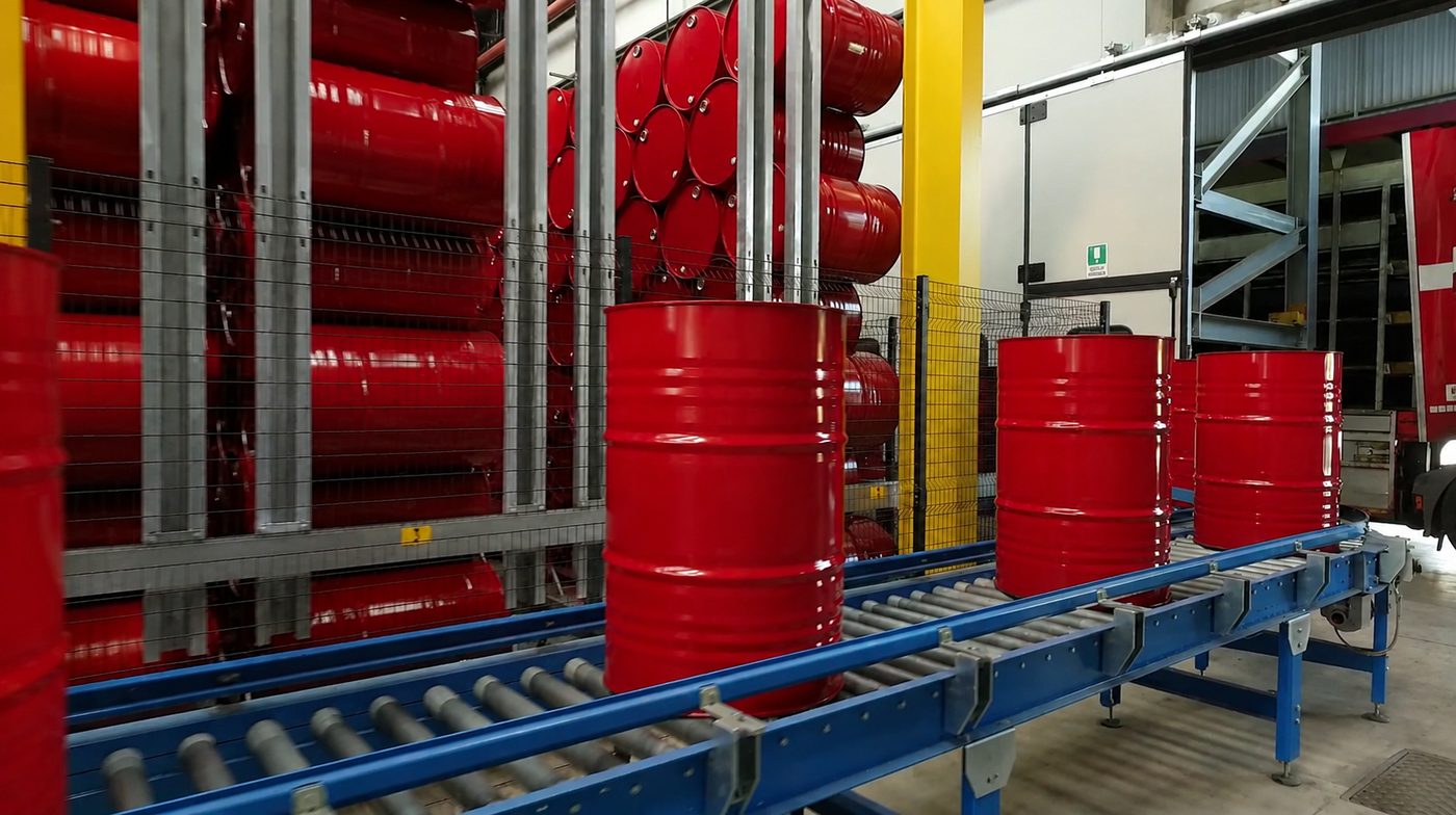Branded lubricant drums in storage